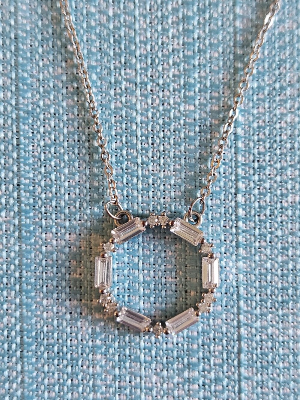 Silvertone Circle Pendant Necklace with Clear Crystal Accents